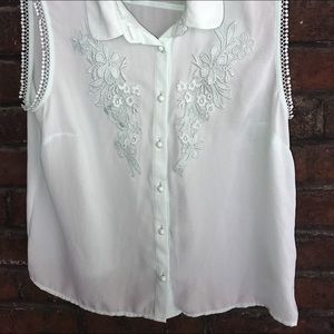 H&M’s mint green sleeveless blouse